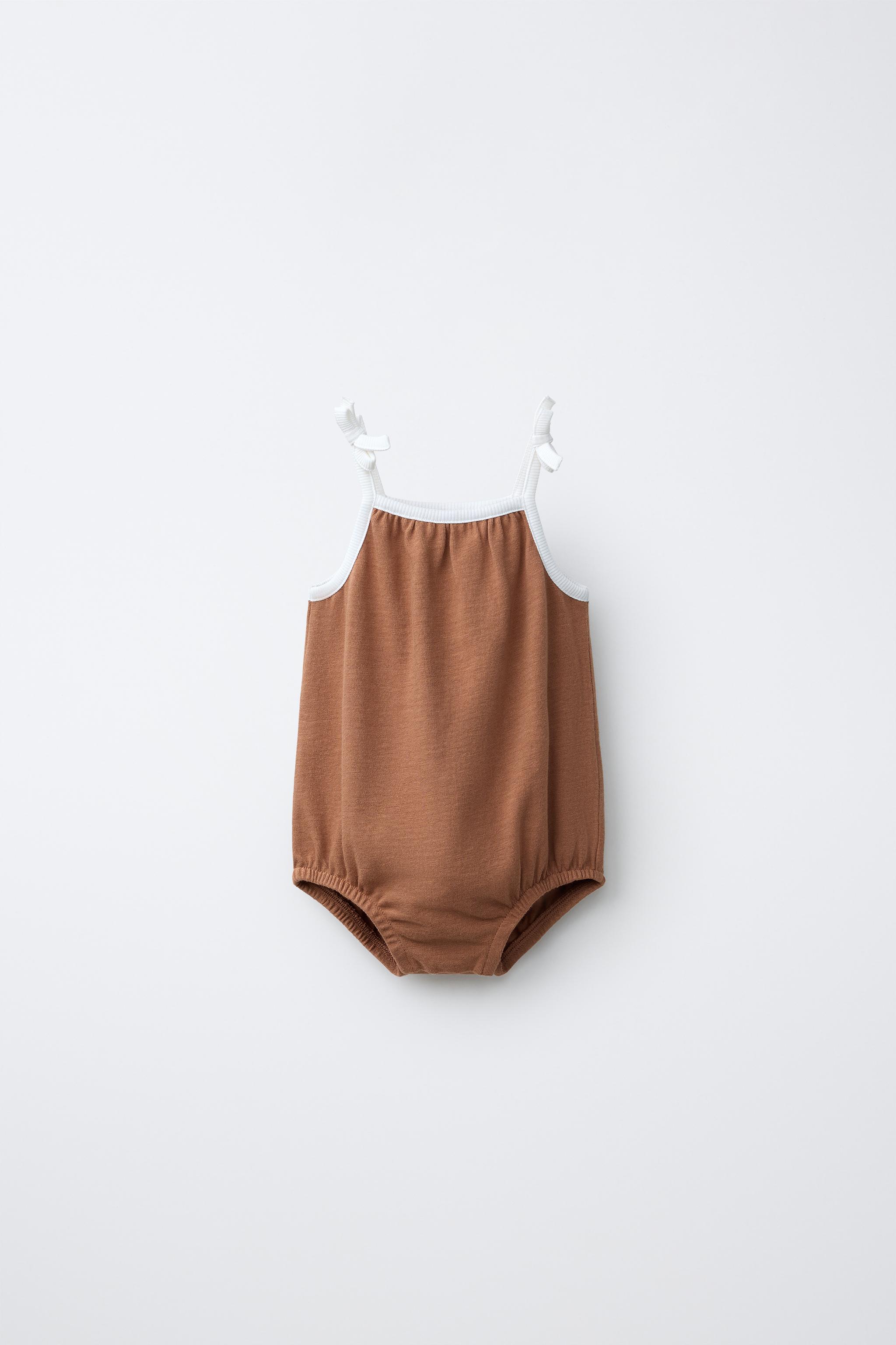 CONTRAST PIPING ROMPER